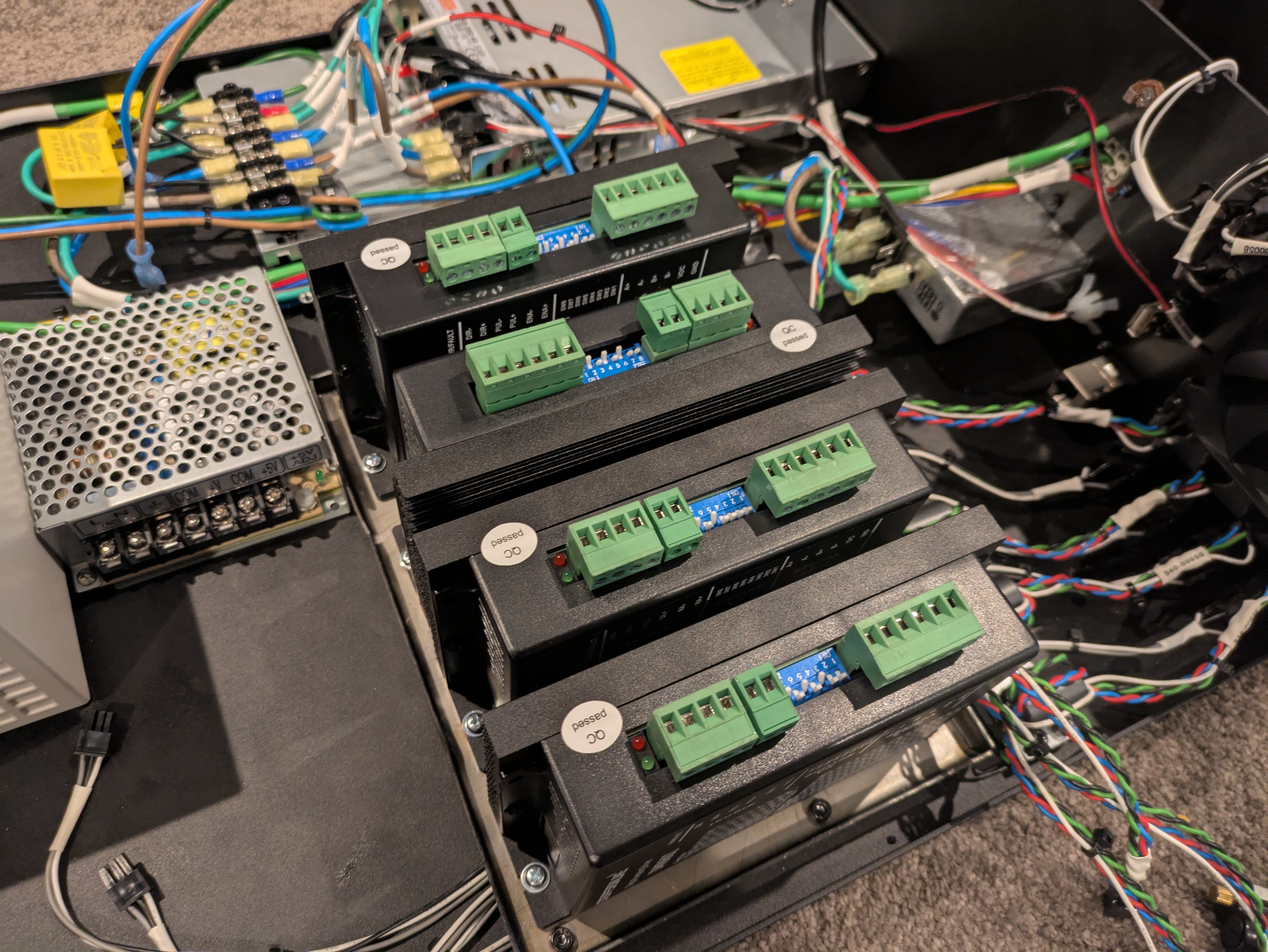 Fabricated stepper driver mounting tray installed in the enclosure